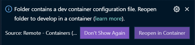 Screenshot showing the VS Code prompt to reopen in container